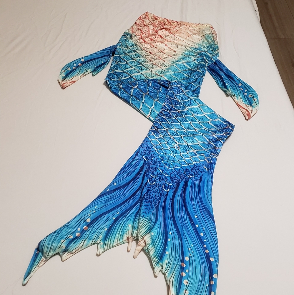 Girl size 10  to 12 mermaids tail used 3 times underwear was never used.